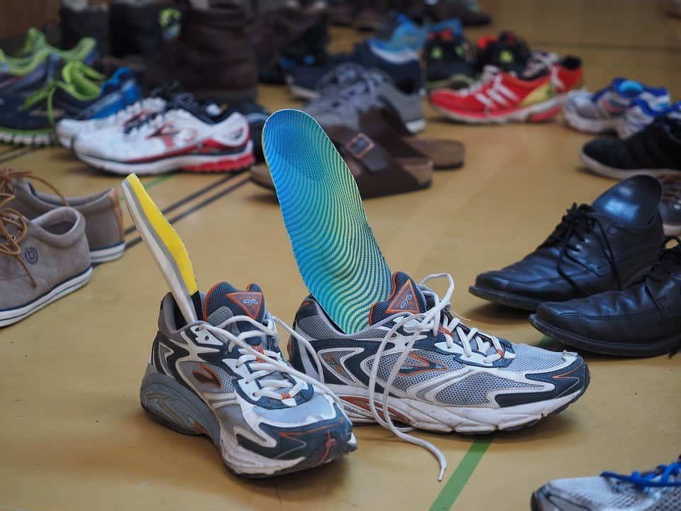 running shoes with insoles sticking out