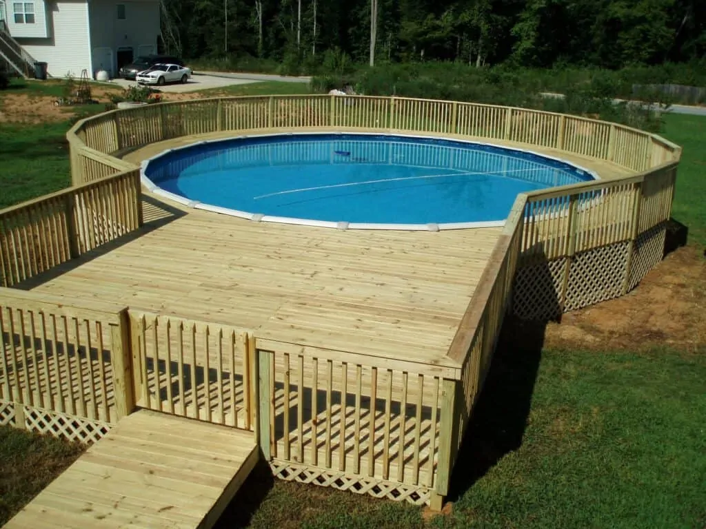 high capacity above ground pool with deck and ladder
